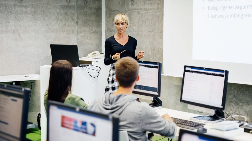 A trainers teaches in her class